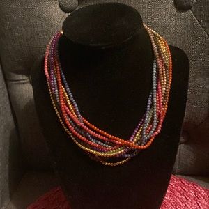 Multi strand, bold colored beaded and gold necklace